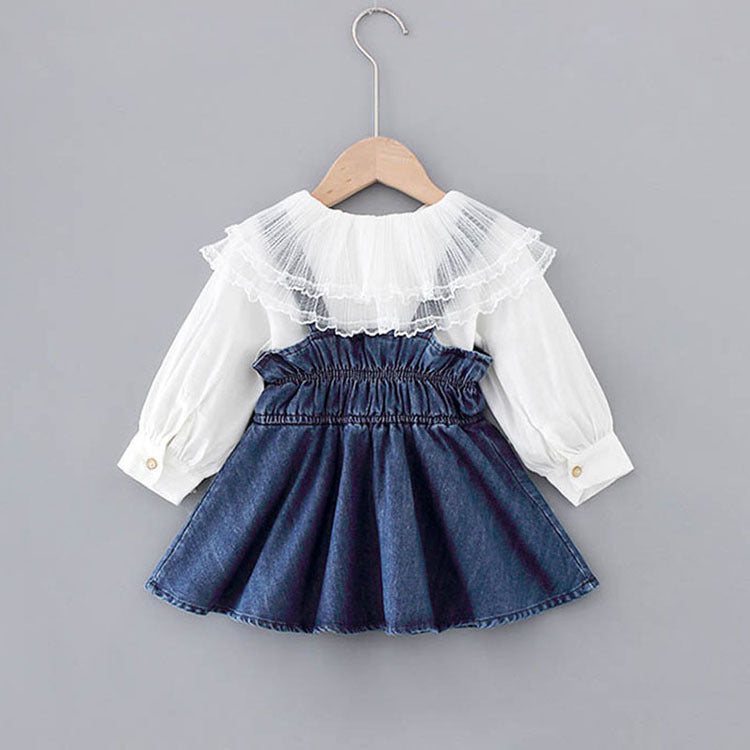 Close-up of lace collar and denim dress combo for baby girls
